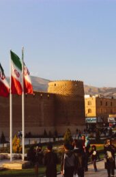 Karim Khan Citadel with Iran flags at sunset, Shiraz, Iran.